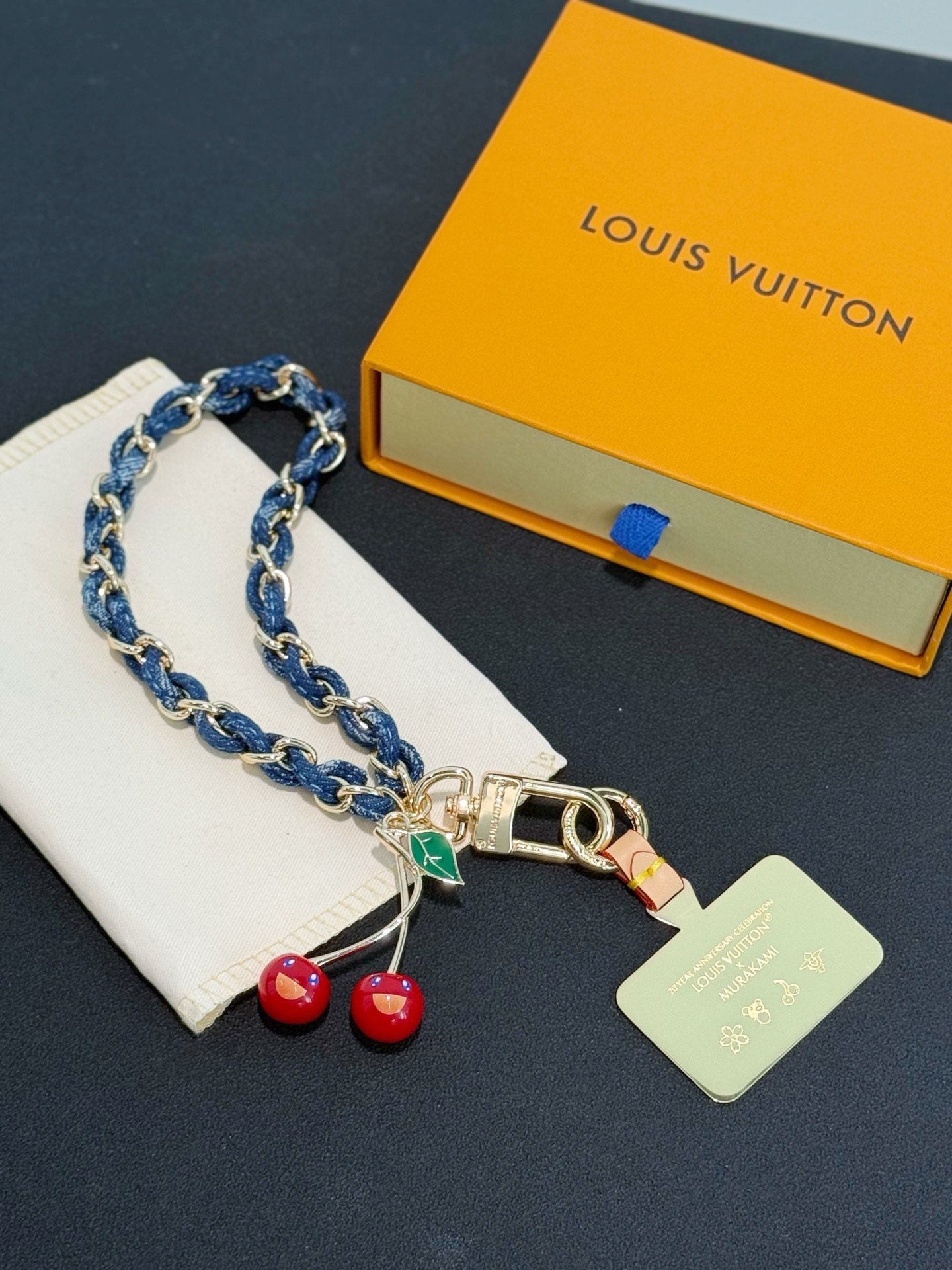 M02623 LV x TM Denim Cerise Phone Holder